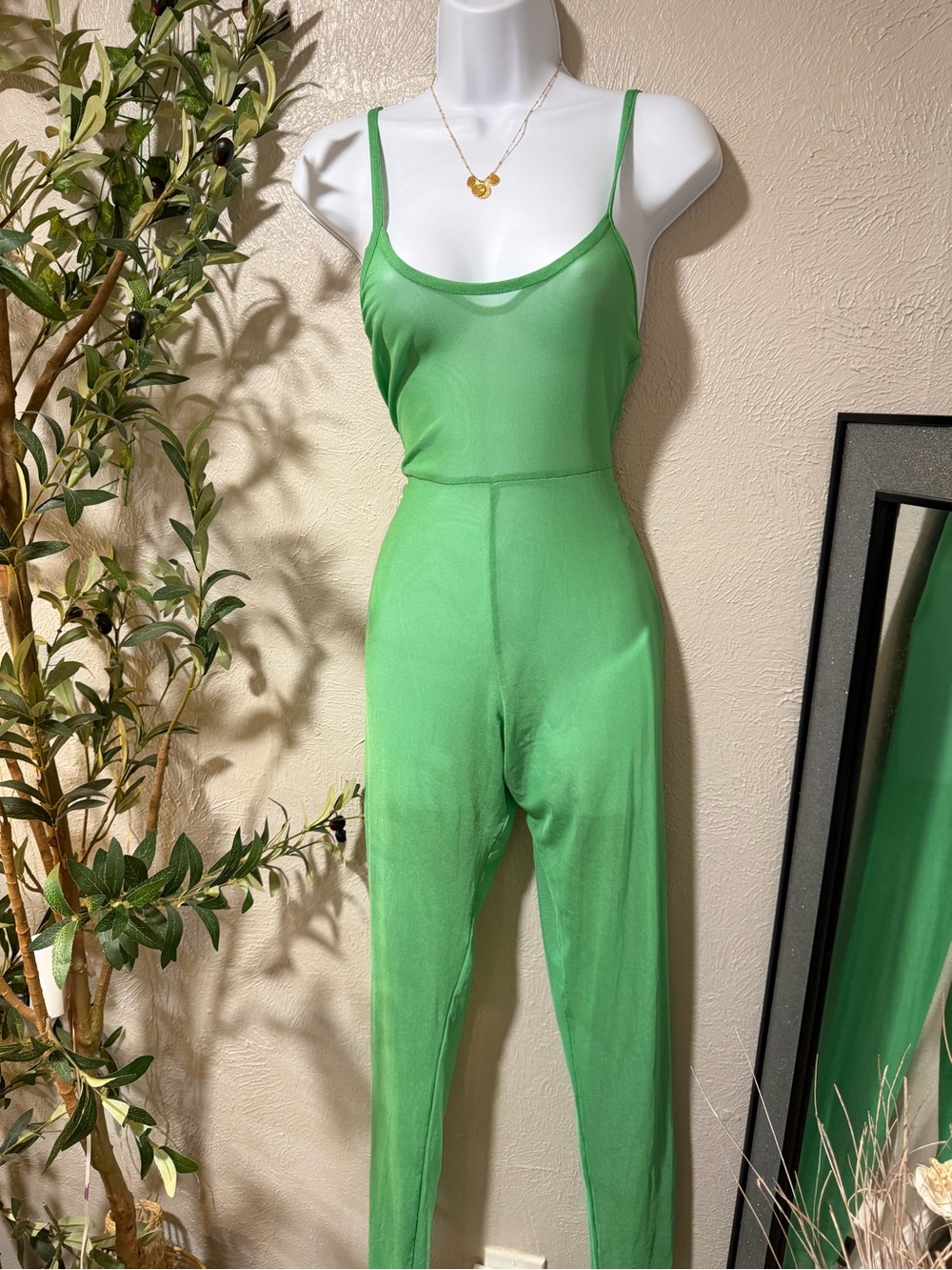 PrettyLittleThing green Asymmetric strap one piece